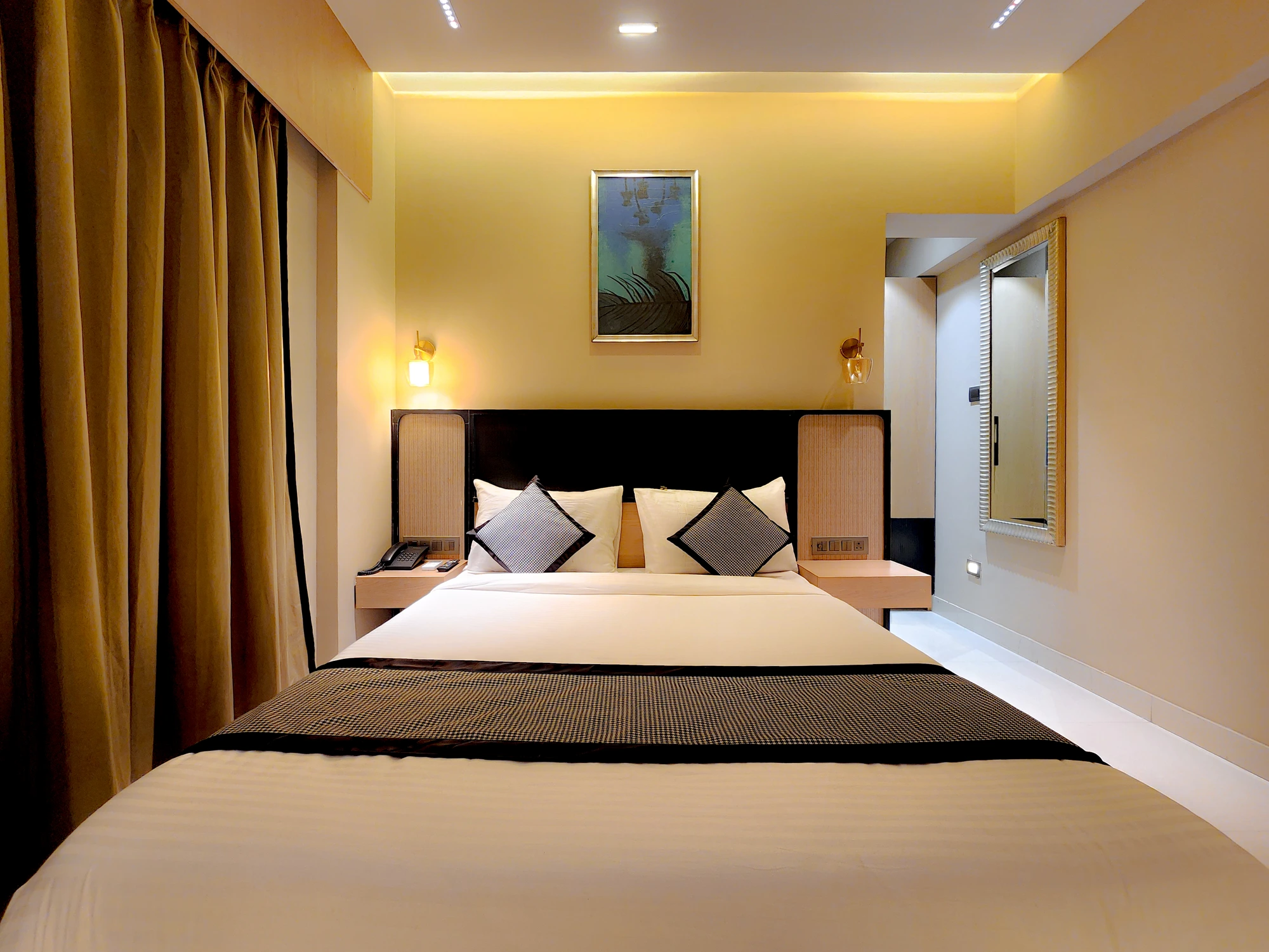 Deluxe Room photo 3 at Hotel Falcon Inn, Byculla